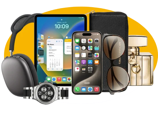 Flat lay of laptops, headphones, phone, and accessories on a desk.